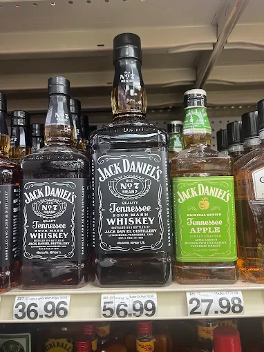 Display of miniature bottled liqueurs in a floor bin