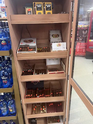 Humidor cabinet filled with cigars and cigarillos