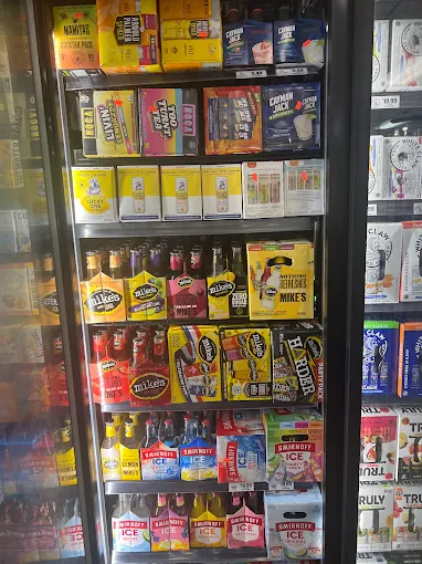 Refrigerated case with Mike’s Hard Lemonade and Smirnoff Ice drinks